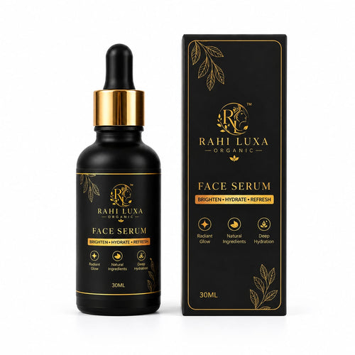 A black glass dropper bottle of Rahi Luxa Organic Face Serum with a gold collar, shown next to its black and gold retail box on a white background.